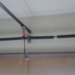 broken garage door torsion spring